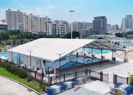 Engineering Dynamics of Curved Tent Systems for Large Scale Venues